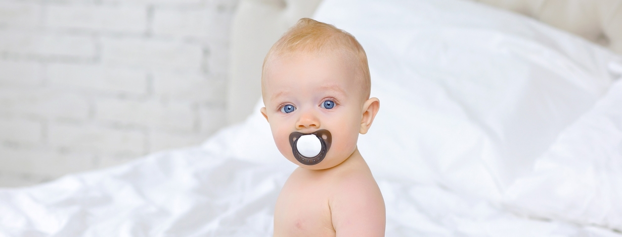 Baby sales biting dummy